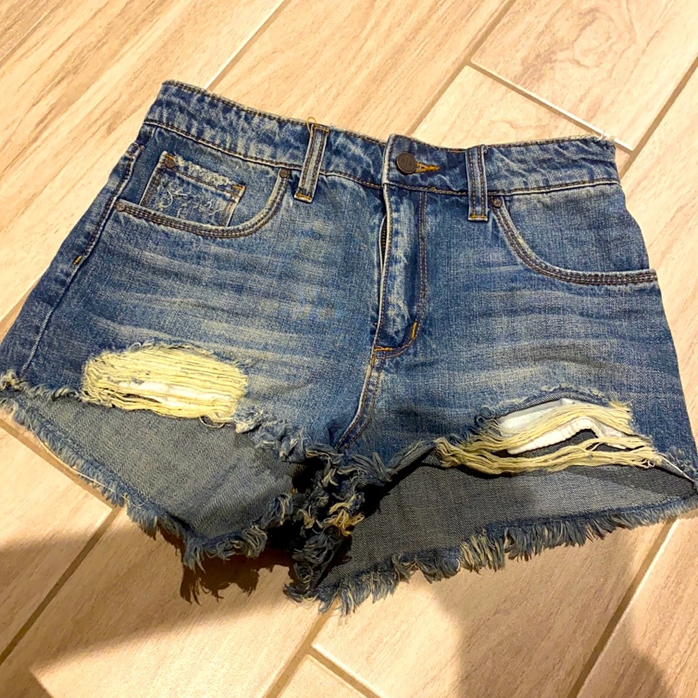 Cute distressed cut offs